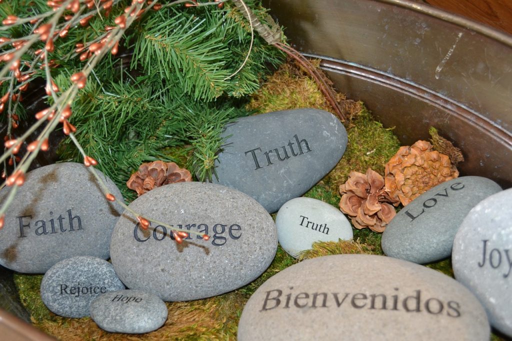 Truth, courage, joy labelled stones.