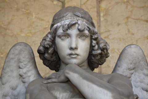 angel sculpture with penetrating eyes represents your conscience