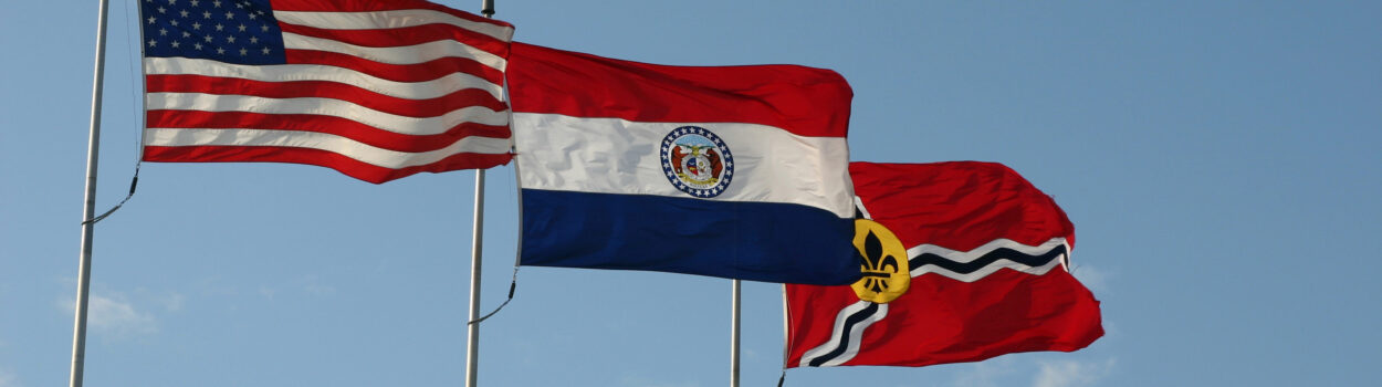 US, Missouri, and City of StLouis flags